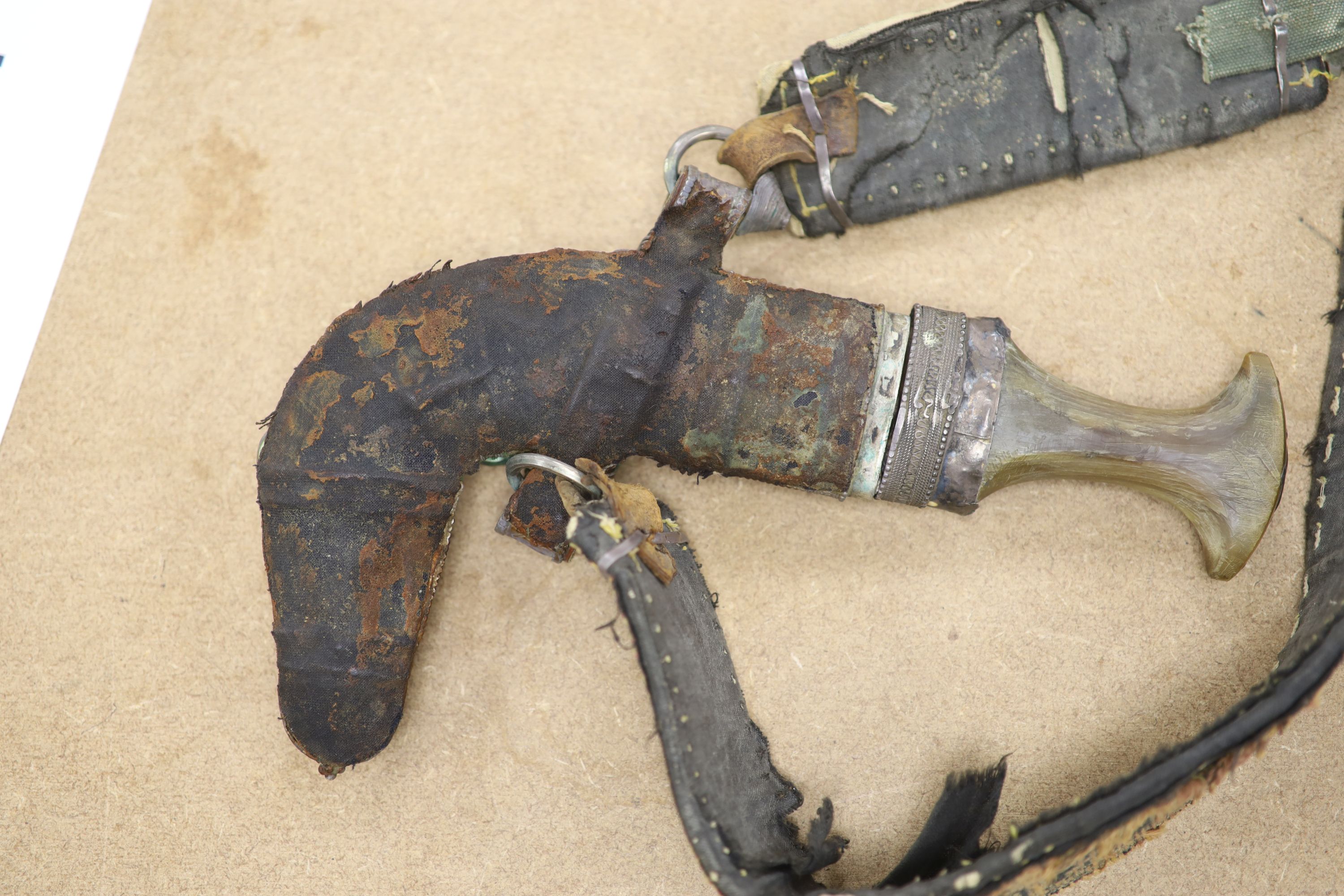 An Arab white metal Jambiya and a group of mainly Arab white metal items